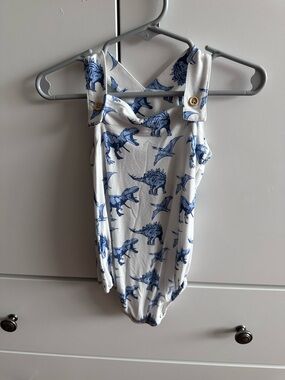 kate quinn White and Blue Dinosaur Print One-Piece Bodysuit
